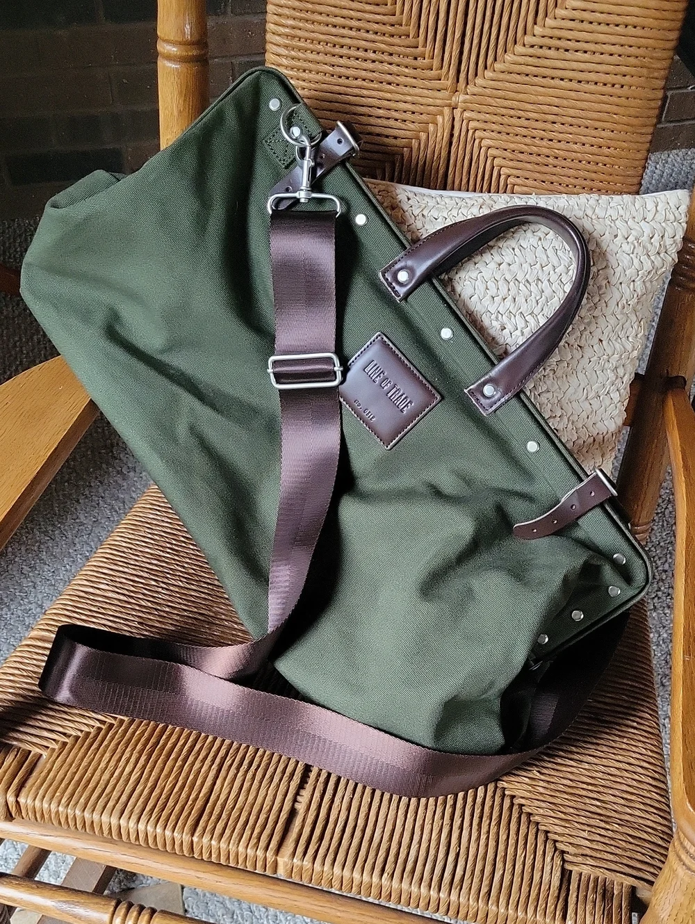 Line of Trade green military duffle sack with brown canvas strap